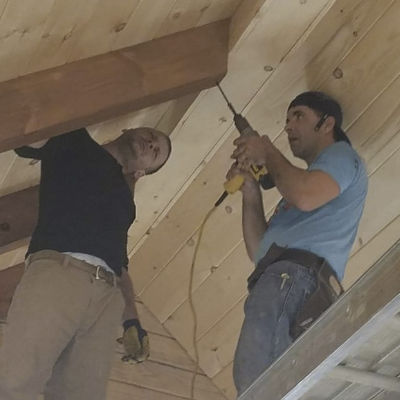 About Us Working on Cabin